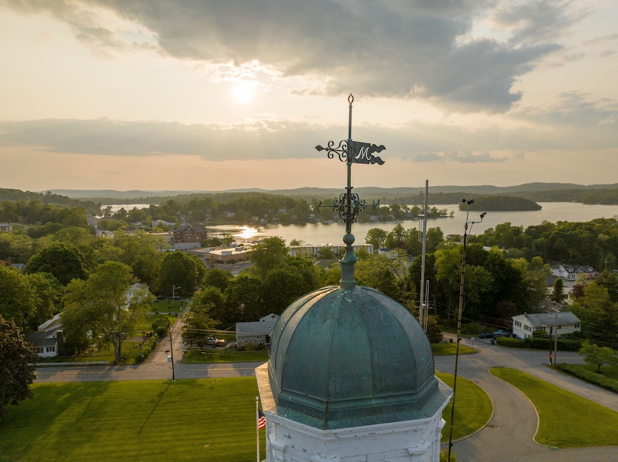 Late afternoon aerial photo of Lake Mahopac located in Town of Carmel, Putnam County, New York.