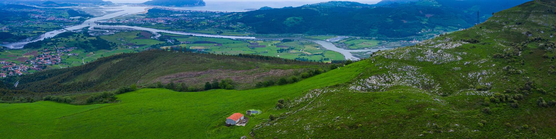View from Pico Candiano. In the background the Rada and Limpias marshes and the Treto estuary and Monte Buciero. Marismas de Santoña Natural Park. Cantabria. Spain, Europe