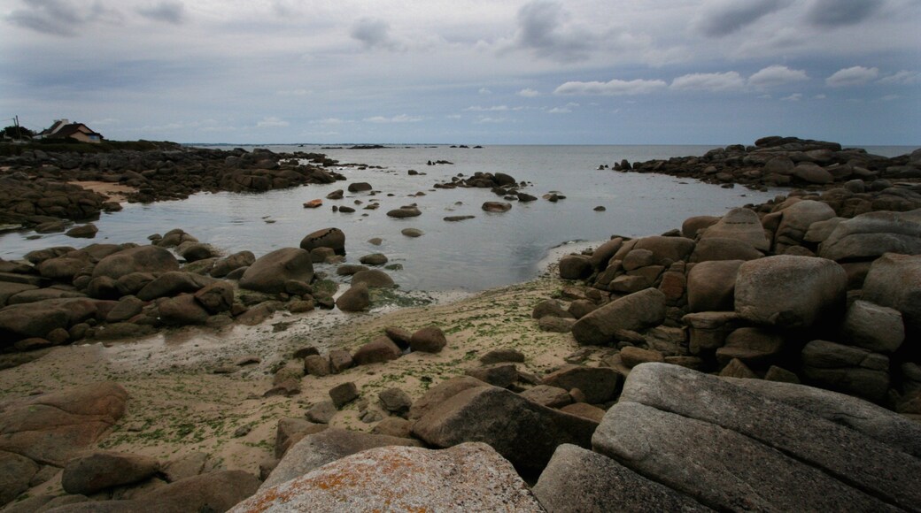 Plouescat which includes a beach, general coastal views and rugged coastline