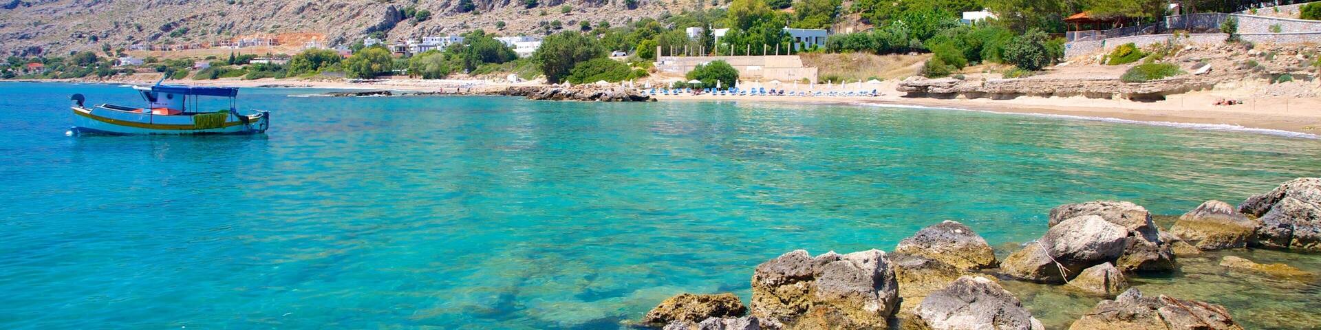 Pefkos Beach which includes rugged coastline and general coastal views