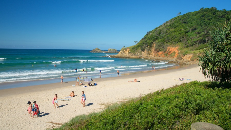 Byron Bay which includes general coastal views, rocky coastline and a beach