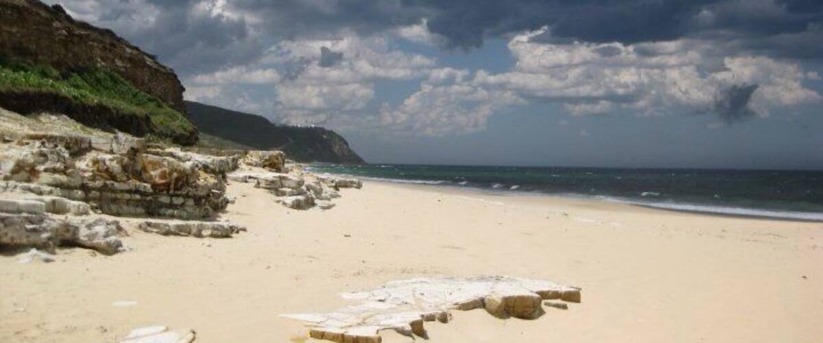 A summer storm breaking at the beach near Glenrock Lagoon.