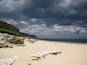 A summer storm breaking at the beach near Glenrock Lagoon.
