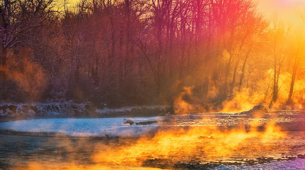The Gallatin River feeds from Yellowstone National Park south of Bozeman, Montana and runs north to Headwaters State Park where it joins with the Madison and Jefferson to form the Missouri River. This shot was taken on a very cold, early November morning. Winter had landed but thermal vents in the river produce beautiful steam effects through the snow and ice.