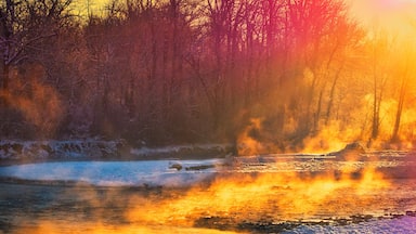 The Gallatin River feeds from Yellowstone National Park south of Bozeman, Montana and runs north to Headwaters State Park where it joins with the Madison and Jefferson to form the Missouri River. This shot was taken on a very cold, early November morning. Winter had landed but thermal vents in the river produce beautiful steam effects through the snow and ice.