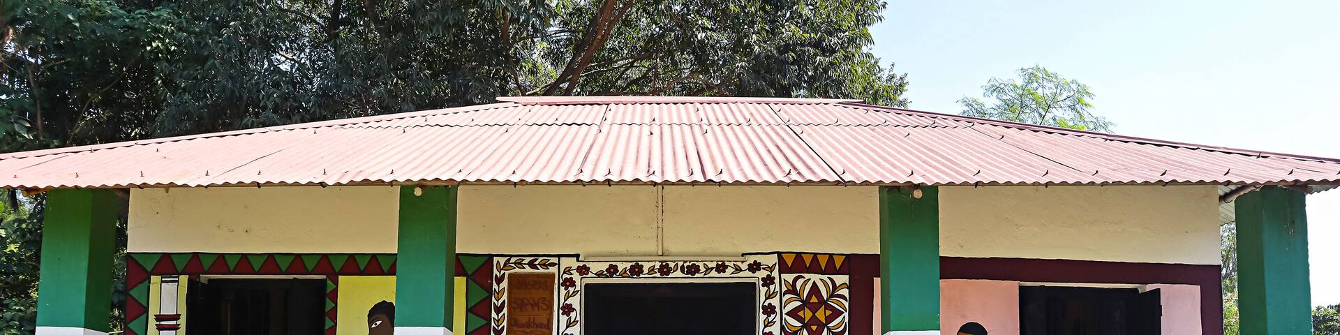 View of a hut displaying traditional tribal equipment and tools in Srijani Shilpagram, Sriniketan, Bolpur, West Bengal, India.