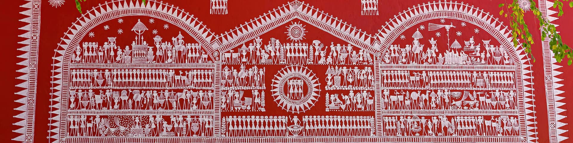 Traditional Warli paintings adorning the Maharashtra tribal hut in Srijani Shilpagram, Sriniketan, Bolpur, West Bengal, India.