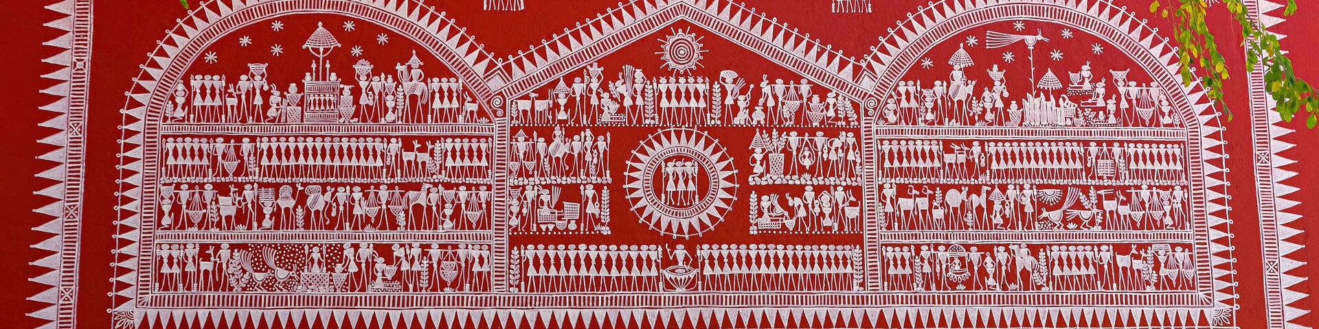 Traditional Warli paintings adorning the Maharashtra tribal hut in Srijani Shilpagram, Sriniketan, Bolpur, West Bengal, India.