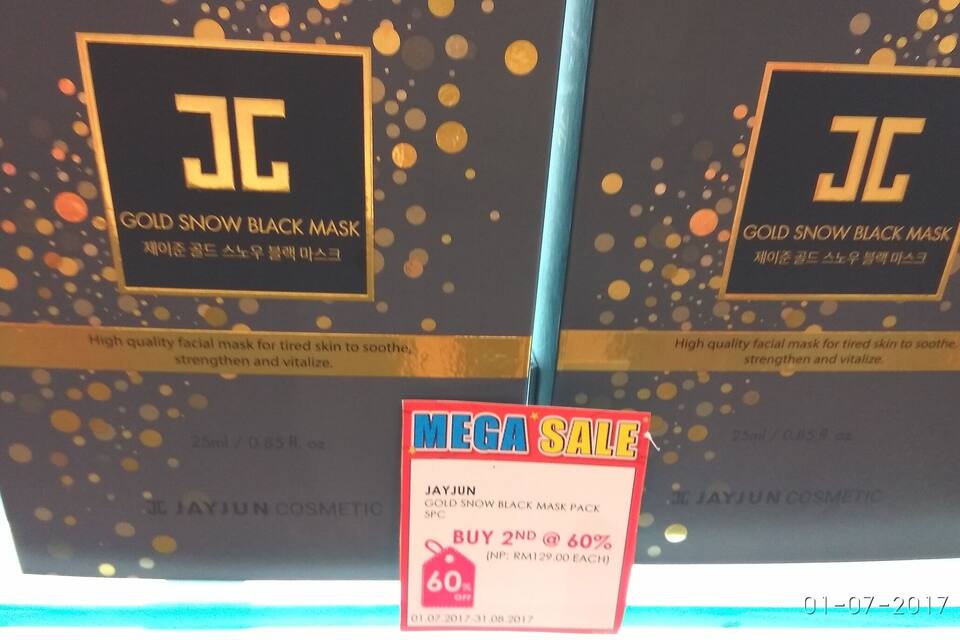 A promotional display for a gold snow black mask by JayJun Cosmetics, featuring a 60% discount on the second item.