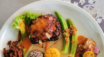 If you happen to travel to Penang Island, Malaysia, try this Nasi 7 Benua. Literally translated to English would be 7 Continents Rice. The 7 continents are actually representing the 7 types of rice served on a plate.
These 7 types of rice are Nasi putih, nasi tomato, nasi lamuni, nasi lemak pandan, nasi hujan panas, nasi kacang and nasi minyak.
For the dishes to be eaten with the rice, feel free to choose from the many selections of chicken, beef, seafood and veggies.
This is really good, you should try if you happen to be in Penang!