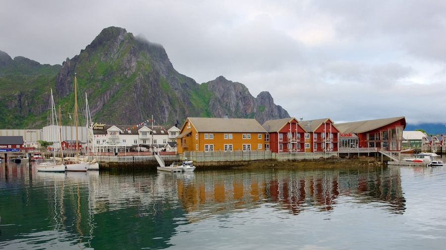 Northern Norway which includes a small town or village, boating and mountains