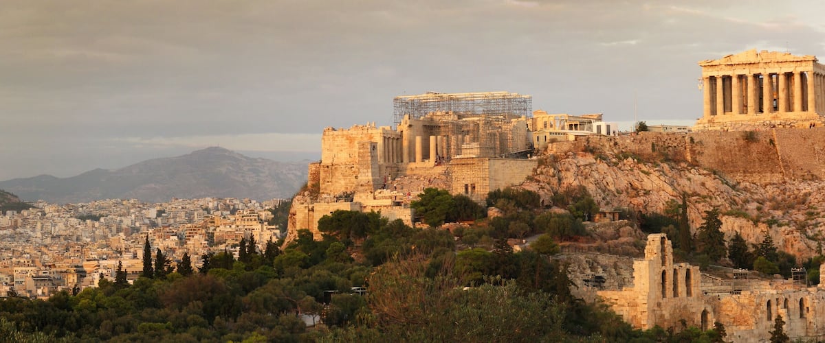 The Acropolis of Athens, including the Parthenon and other ancient ruins.