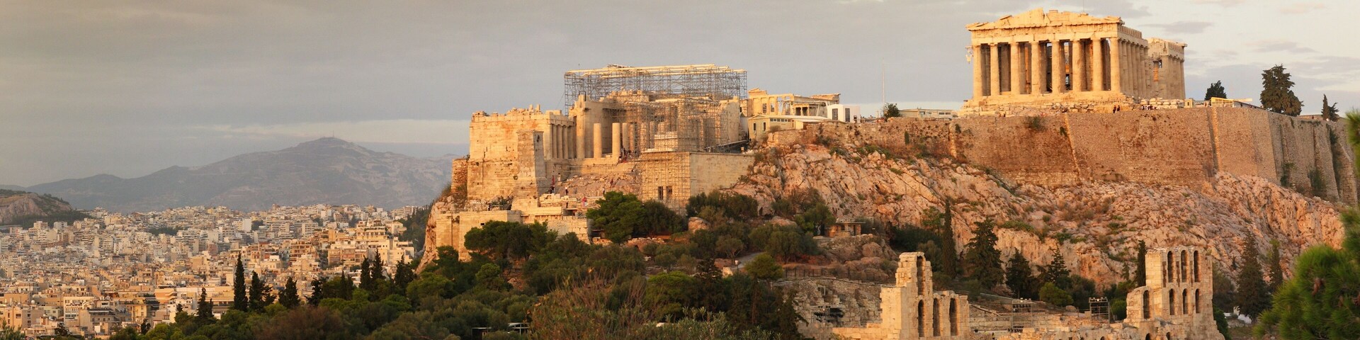 The Acropolis of Athens, including the Parthenon and other ancient ruins.