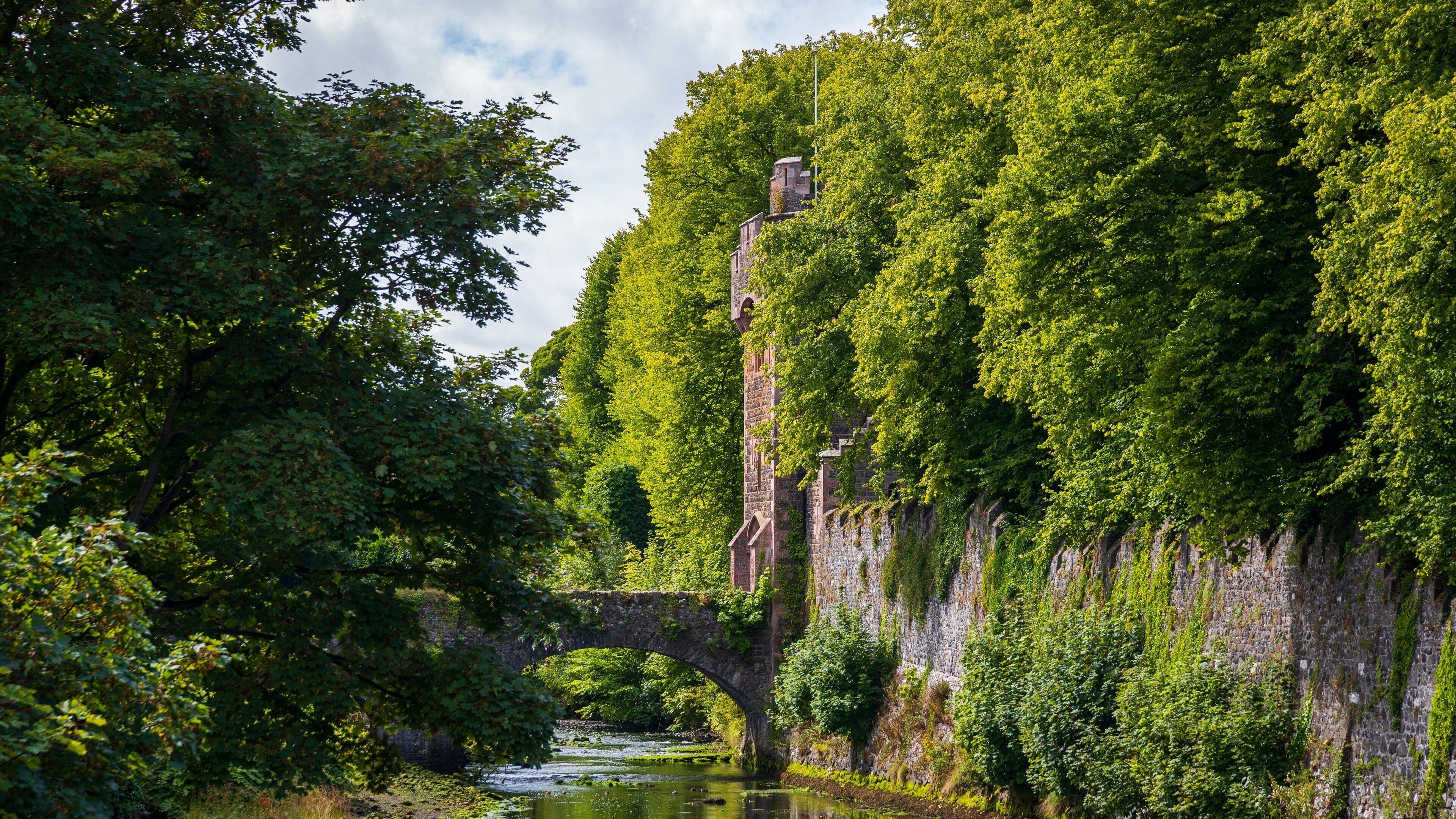 Glenarm featuring a bridge and a river or creek