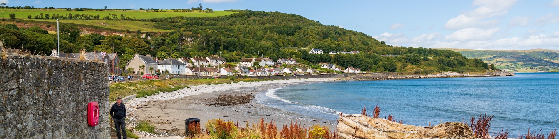 Glenarm which includes general coastal views and a coastal town