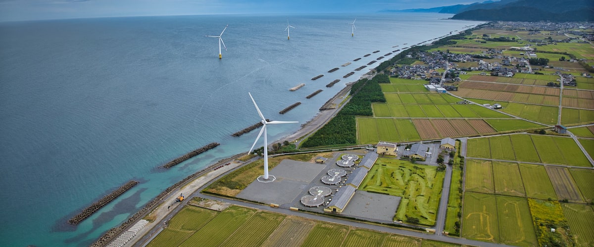 Offshore wind turbines, breakwaters, windbreak forests, etc. on the coastline facing Toyama Bay in Japan