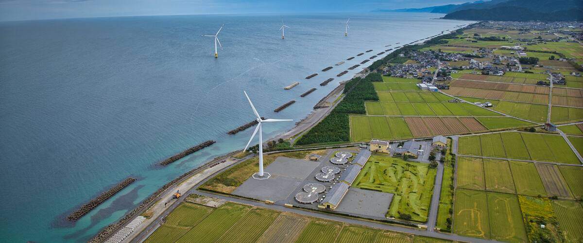 Offshore wind turbines, breakwaters, windbreak forests, etc. on the coastline facing Toyama Bay in Japan