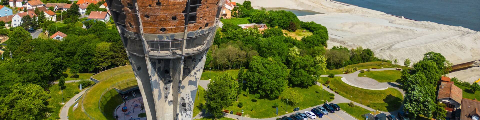 Vukovar Water Tower, a powerful symbol of Croatian resilience and courage, captured from the air. This iconic structure stands tall as a reminder of the city's heroic past