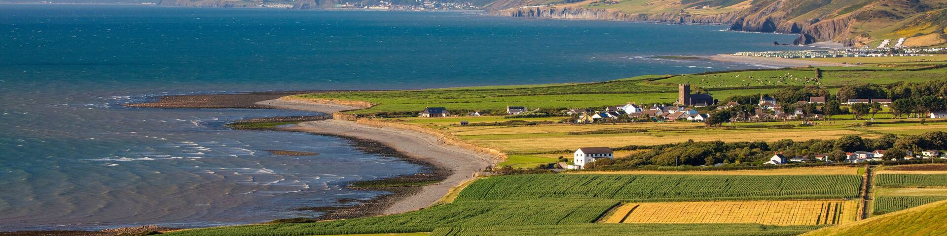 Elevated veiw of Cardigan bay with the small town of llanon in the forground. West Wales, UK.