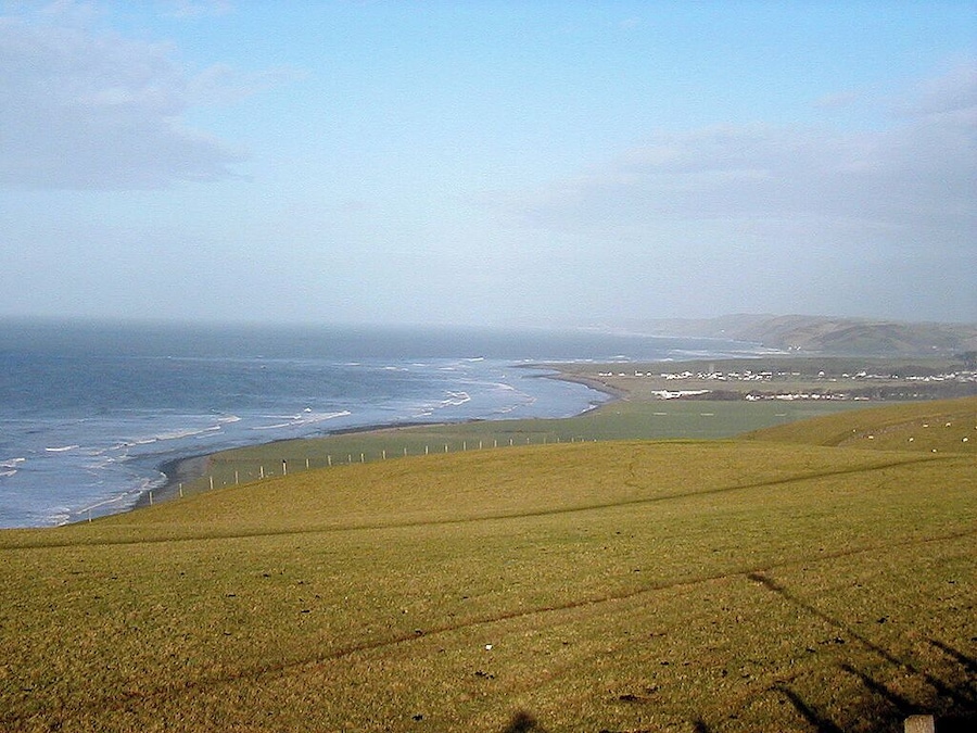 Beside the A487 A view over Cardigan Bay, on a windy January Day. Llanon and Llansantffraed can be seen on the right.