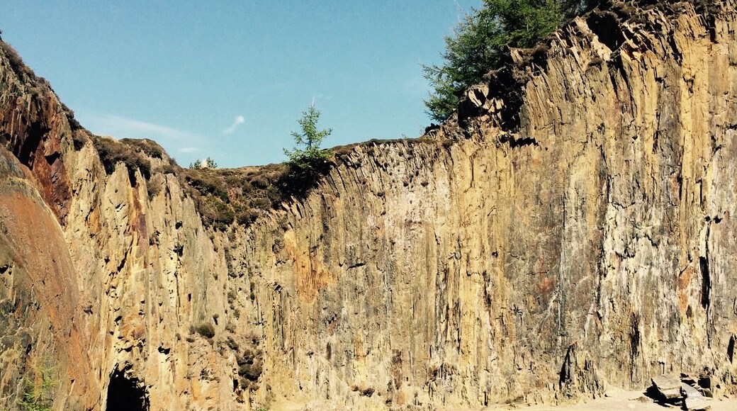 Disused quarry near Fairbourne. The lake is a sheer drop