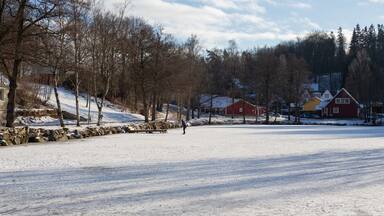 Man skateing on the pond in Tyringe, Sweden