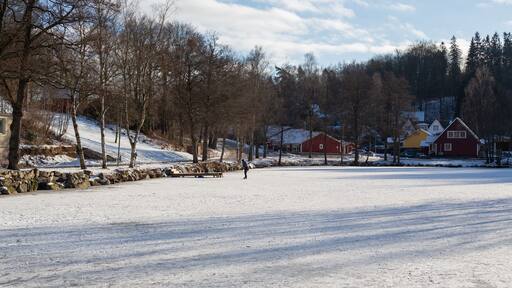 Man skateing on the pond in Tyringe, Sweden