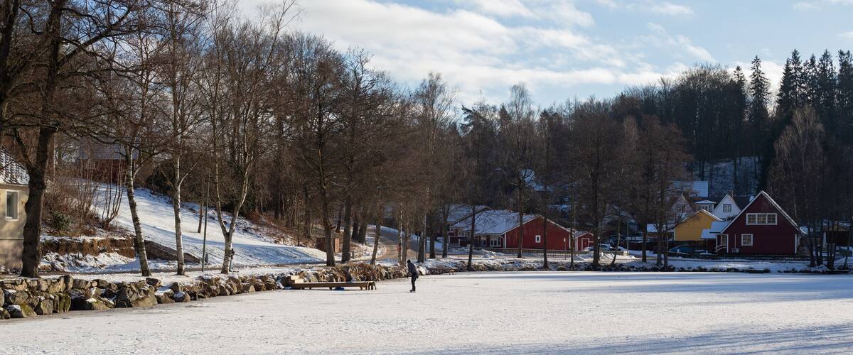 Man skateing on the pond in Tyringe, Sweden
