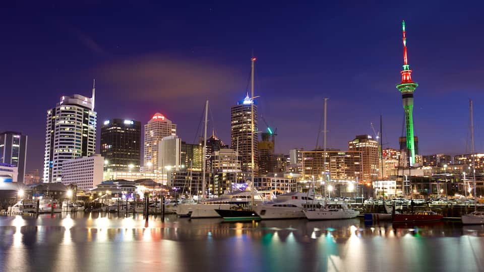 Viaduct Harbour featuring a high rise building, night scenes and a bay or harbor