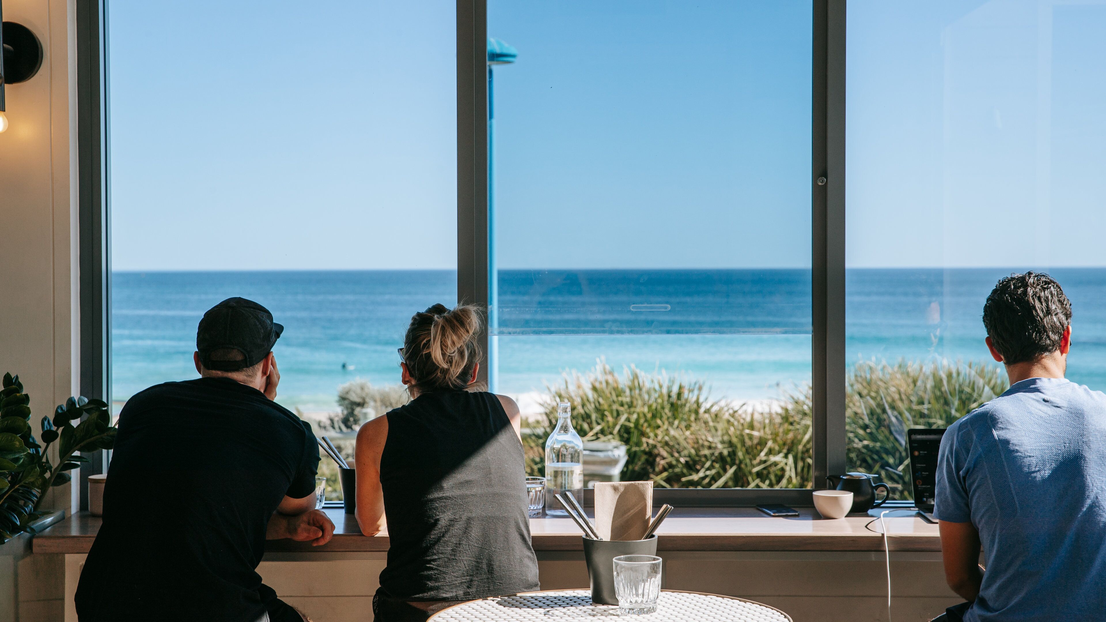 Trigg featuring interior views and cafe lifestyle as well as a small group of people