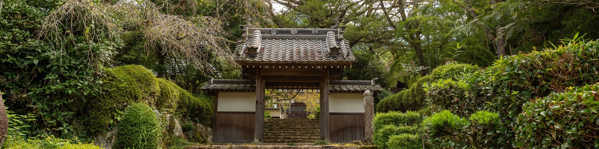 Main gate of Daisyu-ji temple in Sanda city, Hyogo, Japan. Translation: Chinese characters on three tiles mean the name of this temple