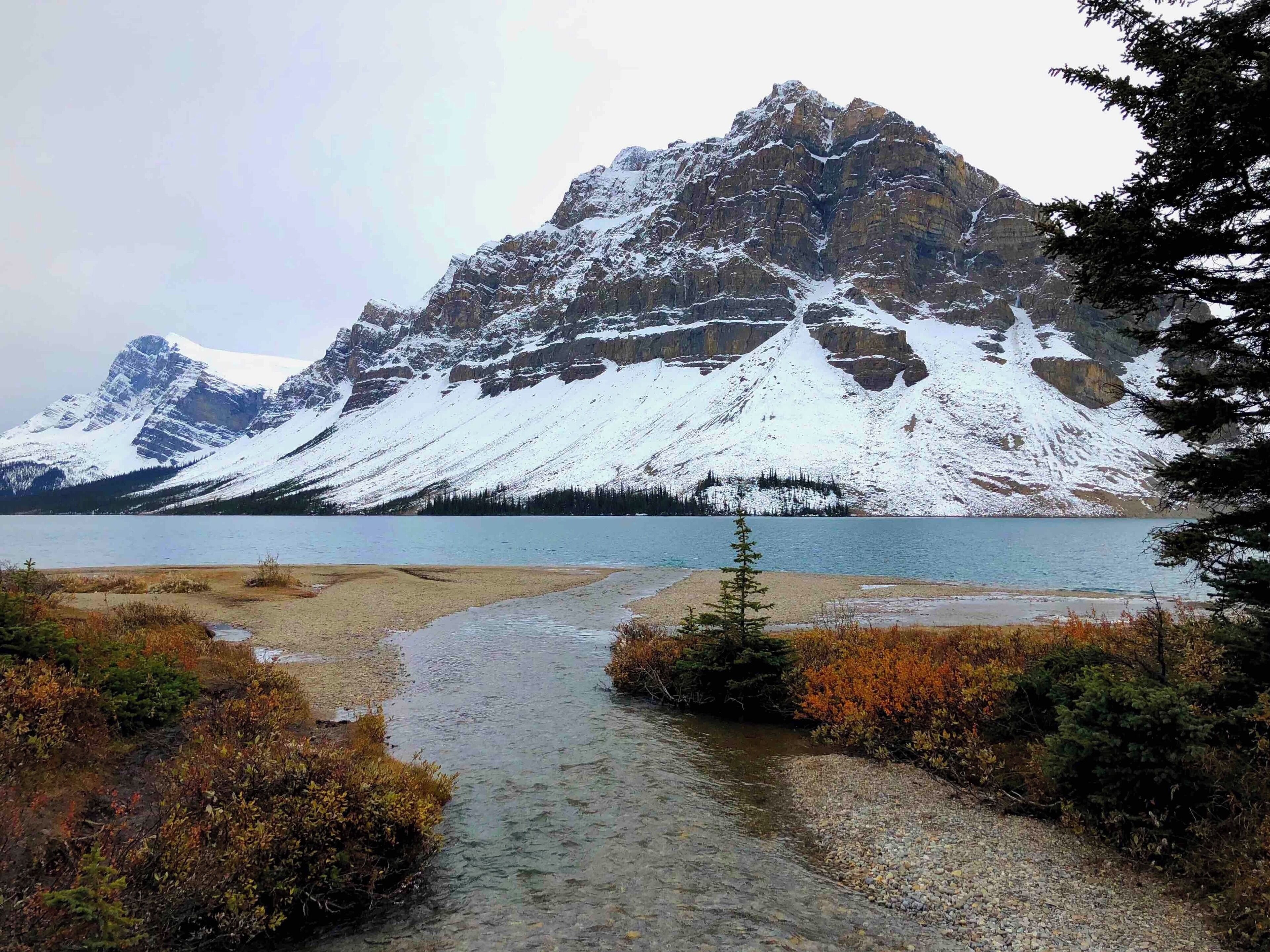 The Crowfoot Mountain (elevation 3,055 m) at Bow Lake, which is the source of the Bow River. Taken after an usual early snowfall.

#mountain #lake