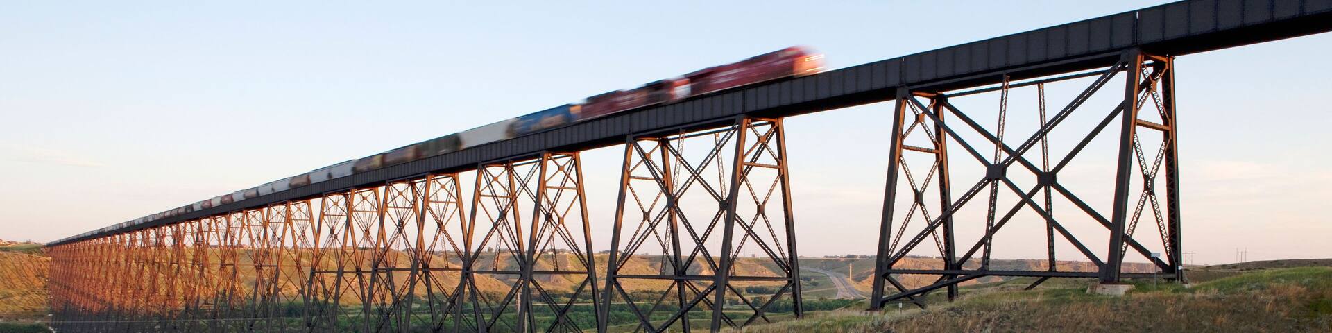 Eastbound Train Crossing Canadian Pacific Railway's High Level Bridge On Its Crowsnest Subdivision; Lethbridge, Alberta, Canada