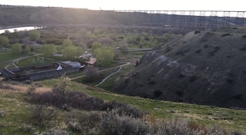 There is a trail behind the Fort. There is a bridge and switchbacks leading all the way up the hill. This will be your view from the top.