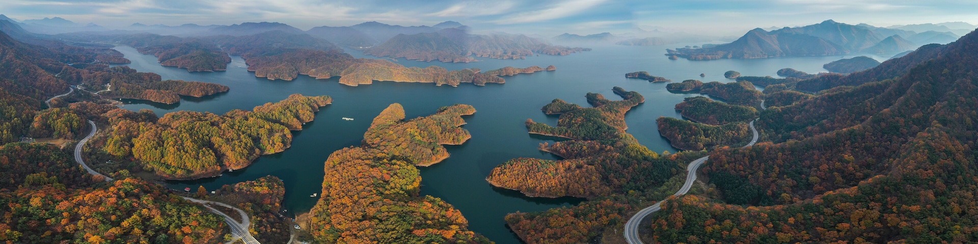 Panorama view of beautiful mountains in autumn at Chungju Lake, South Korea.