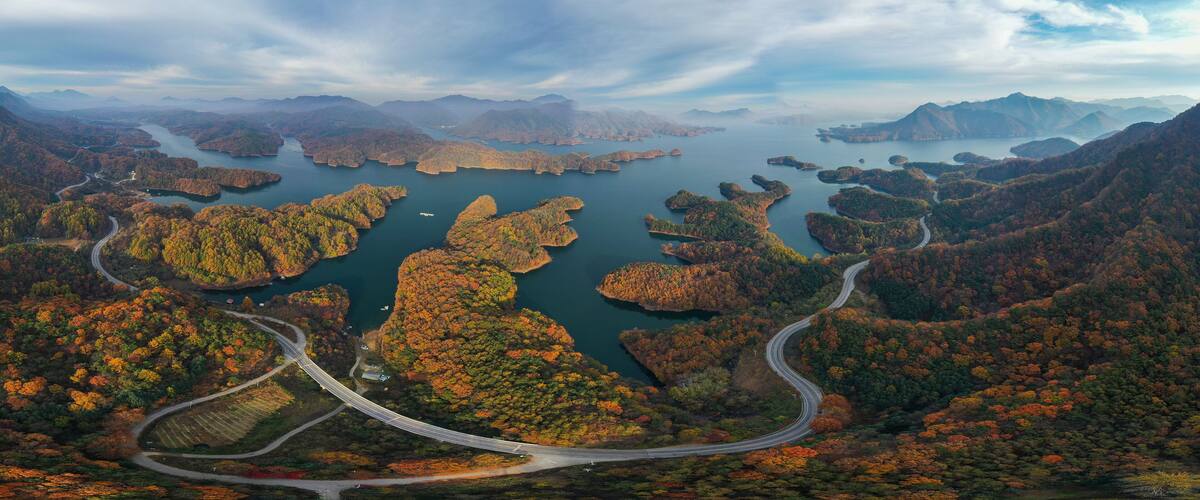 Panorama view of beautiful mountains in autumn at Chungju Lake, South Korea.