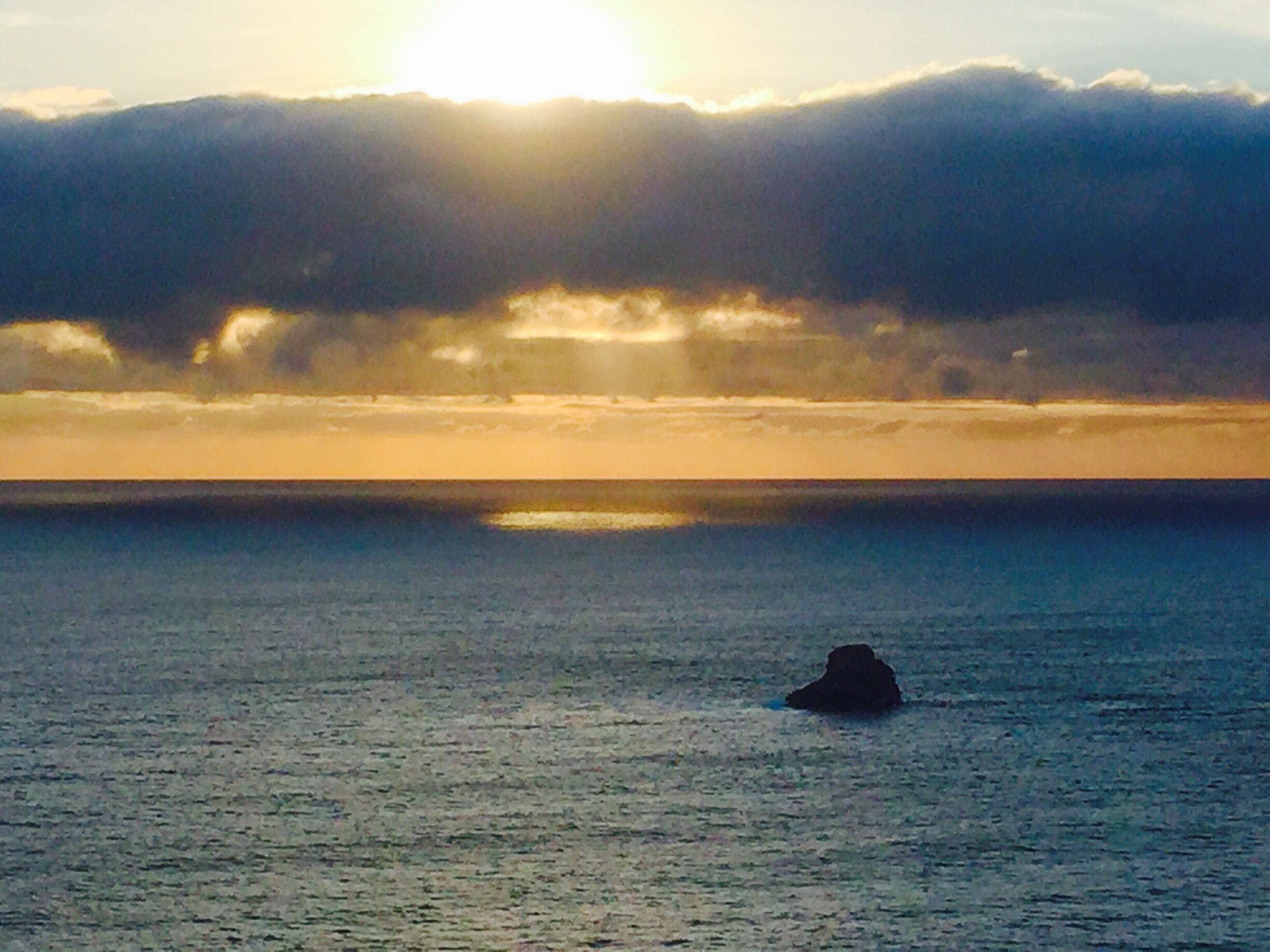 Watching the Sunset at the "end of the world". Finesterra, Spain