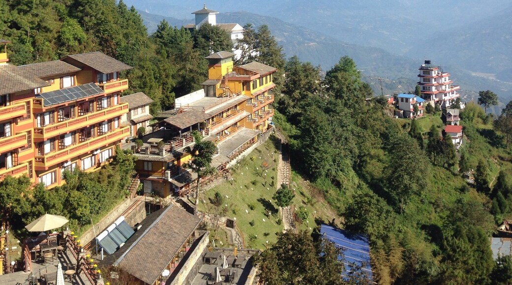 Nagarkot, 30+km from Kathmandu. Travel time by car about 2hrs or more. A place to relax and enjoy Himalayas, sunrise and sunset.