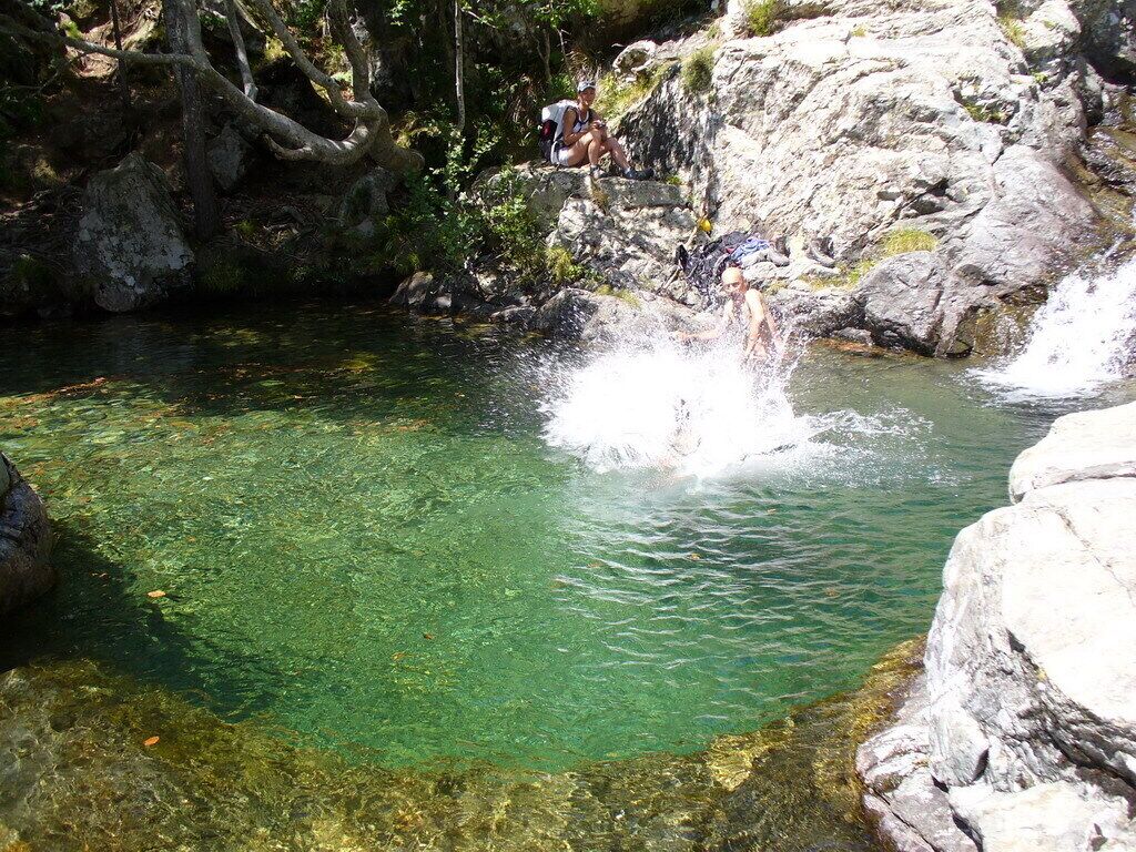 Corsica - Cascade des Anglais - guy jumping in the pond