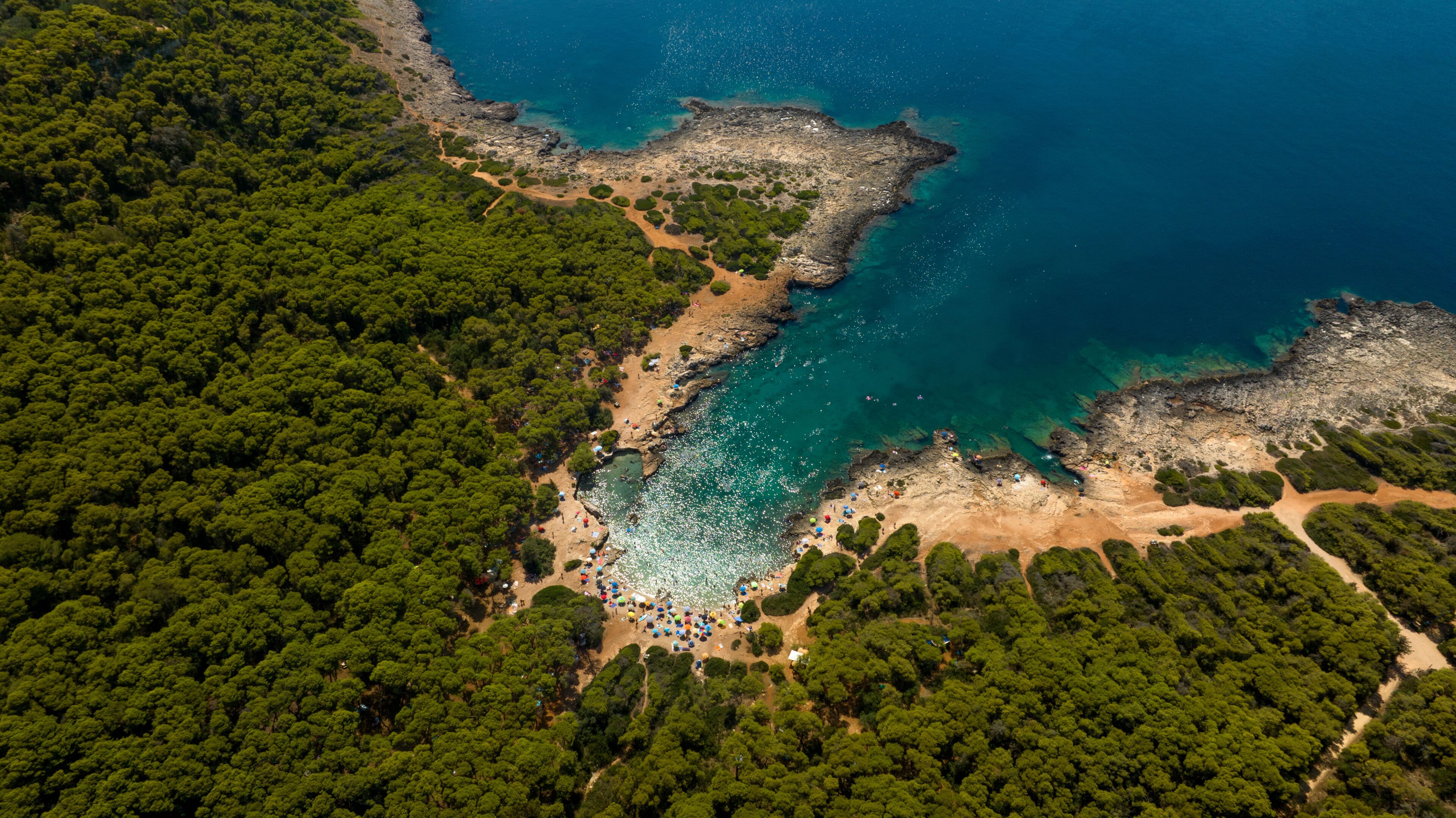 Aerial view of the beach in the Porto Selvaggio Regional Natural Park in Salento. It is a protected natural area of ​​Puglia located in the province of Lecce, Italy.