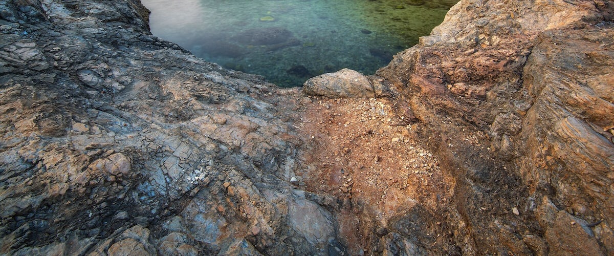 Porto Selvaggio, is a beautiful marina in the town of Nardo, located on the Ionian coast of the province of Lecce. This location is particularly important from an environmental point of view, as the territory is included within the "Parco Naturale Regionale di Porto Selvaggio e Palude del Capitano" It is a particularly cliff coasts surrounded by lush vegetation, which is why one has the impression of being in a beautiful place in the mountains just a short walk from the sea. It has a beautiful and charming bay on which to spend an unforgettable day by the clear sea and colorful. From the bay you can see, on your right Torre Uluzzo, on the left of the High Tower and very close to a small beach, characterized by the fact that in some places, swimming, you can meet freshwater springs. It is a place much loved for its splendor, full of very rugged rocky bays and natural coves, alternating with short stretches of sand.