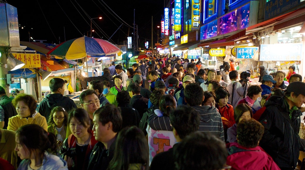 Sokcho which includes a city, night scenes and markets