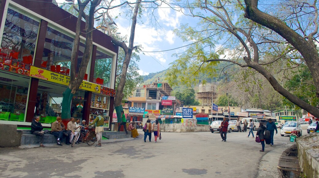 Kathgodam featuring street scenes as well as a large group of people