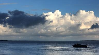 Diamond Harbour, West Bengal, India. July 2023. A boat sailing through the Hooghly River near Diamond Harbour, West Bengal, India.