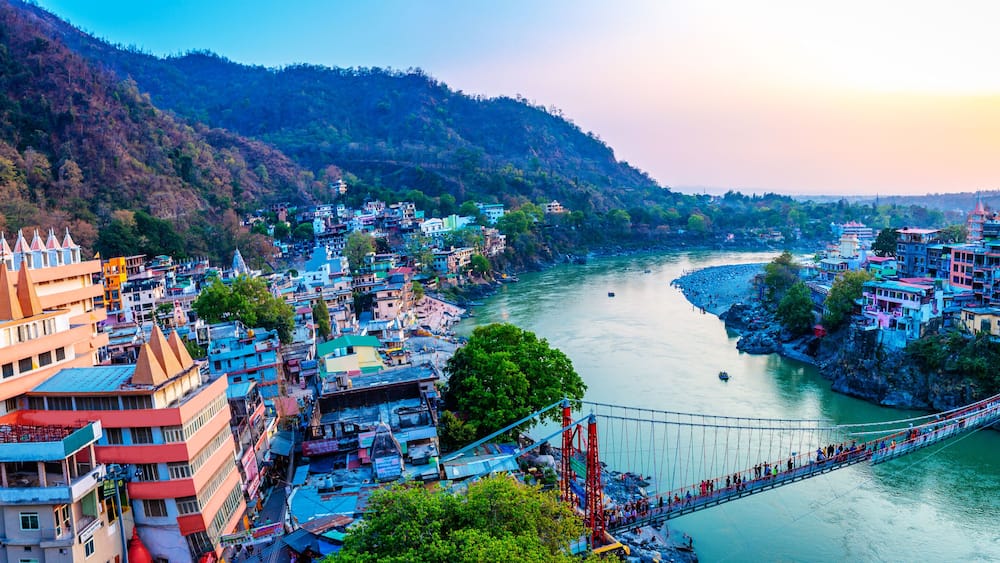 Rishikesh, yoga city India, Ganges River valley, Ganga, Uttarakhand during sunset. Rafting, raft