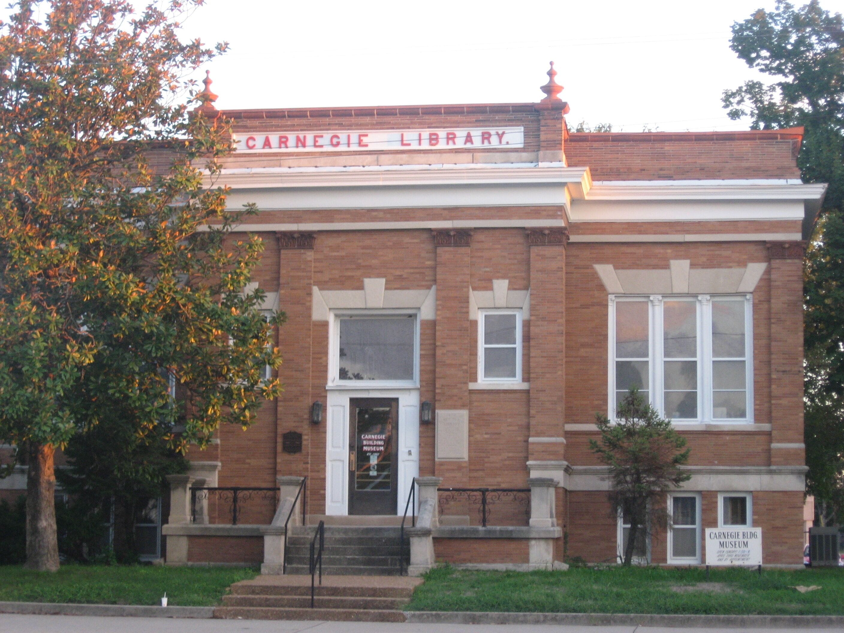 A brick building with a sign reading "Carnegie Library."