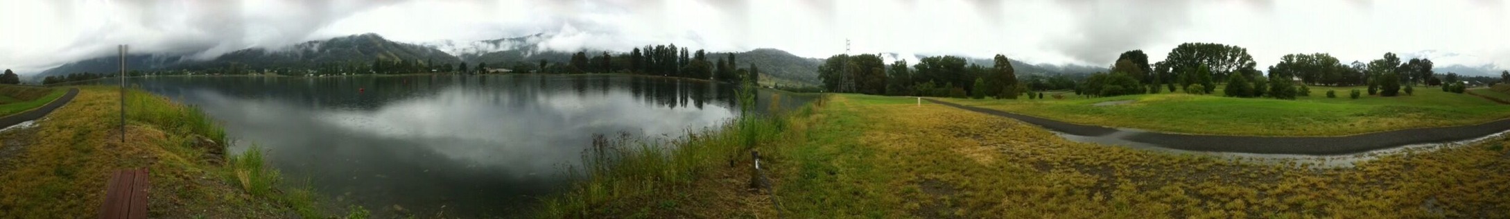 This is a man made pond age to regulate water flow into streams from the mountains.