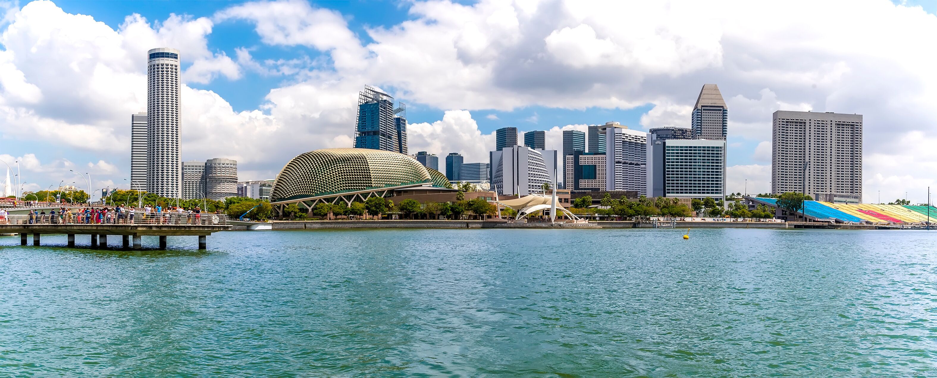 A panorama view from a riverboat across the bay on the Singapore river towards the esplanade in Singapore, Asia