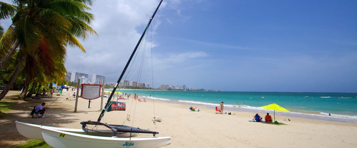 Isla Verde Beach featuring boating, sailing and a beach