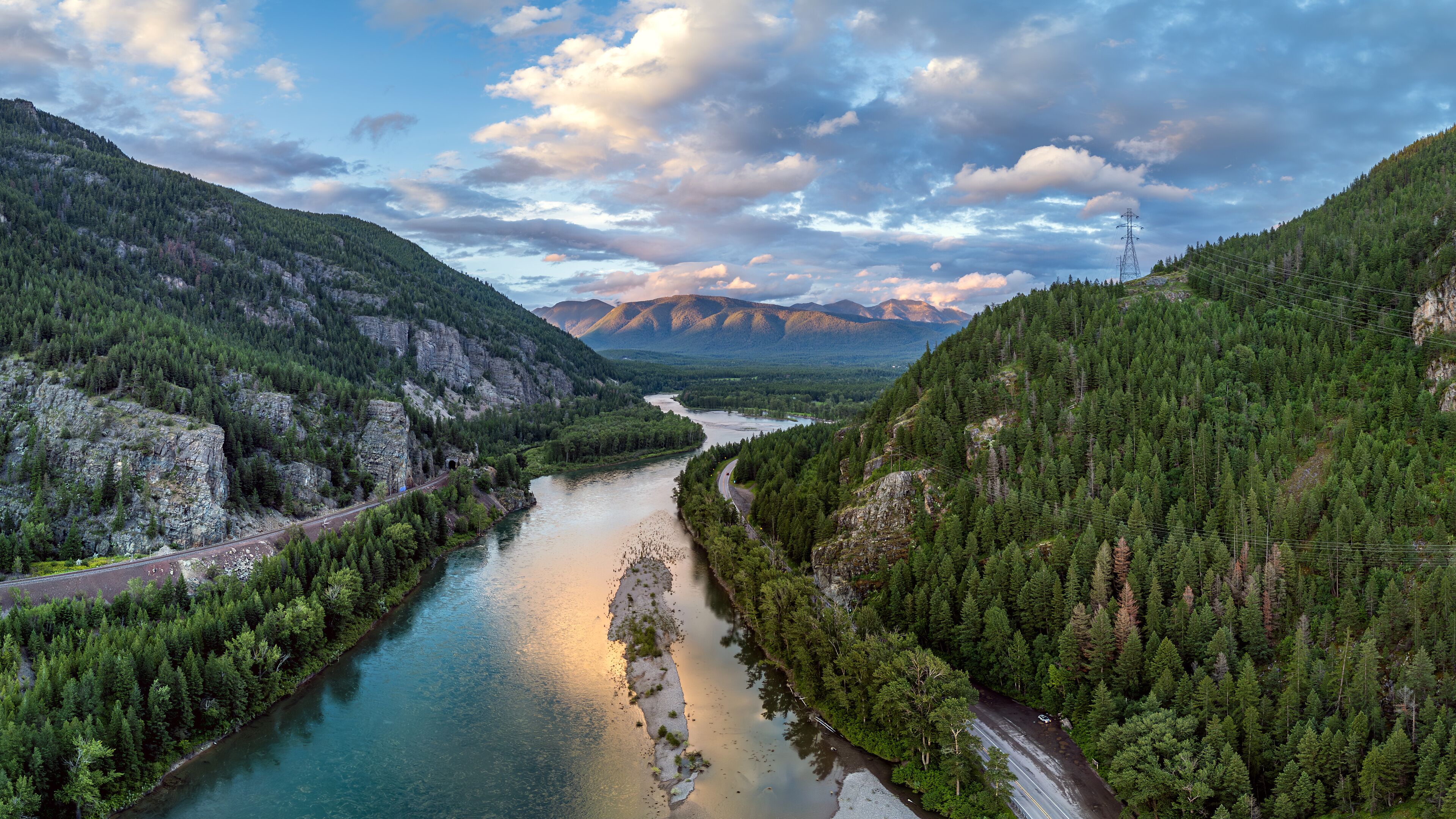 Flathead River, Hungry Horse, Montana. USA. Near western entrance of Glacier National Park.  Serene River Valley at Sunset